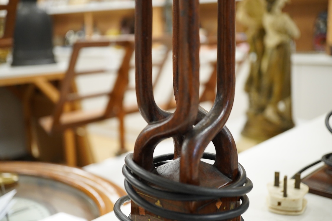 Three Indian hardwood table lamps with shades, 52cm high